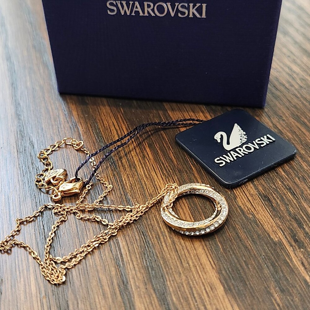 New Swarovski gold swirl pendant necklace